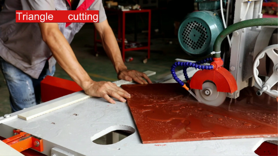 Small hand push tile cutter.